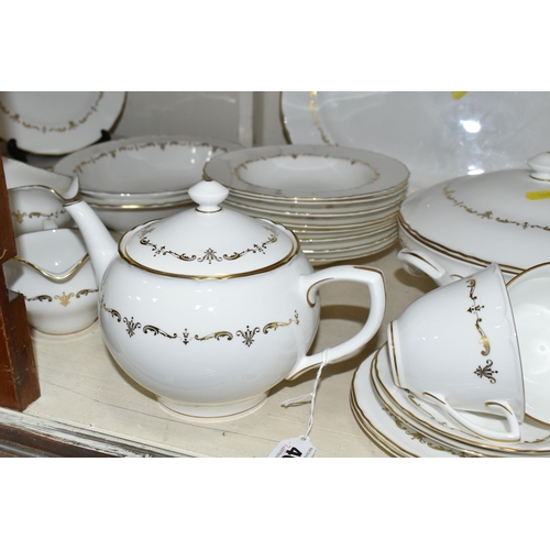 403 - A ROYAL WORCESTER 'GOLD CHANTILLY' PATTERN DINNER SET, comprising eight dinner plates, one meat plat... 