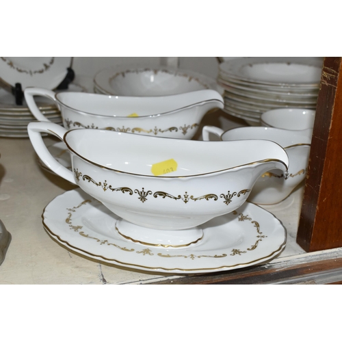 403 - A ROYAL WORCESTER 'GOLD CHANTILLY' PATTERN DINNER SET, comprising eight dinner plates, one meat plat... 