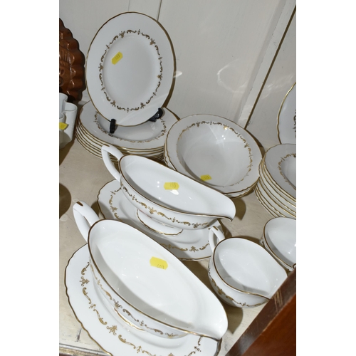 403 - A ROYAL WORCESTER 'GOLD CHANTILLY' PATTERN DINNER SET, comprising eight dinner plates, one meat plat... 