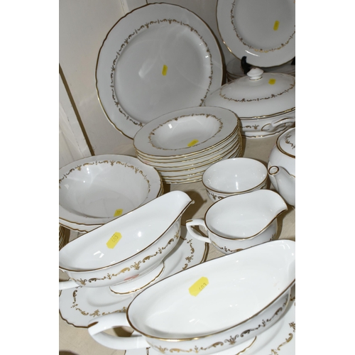 403 - A ROYAL WORCESTER 'GOLD CHANTILLY' PATTERN DINNER SET, comprising eight dinner plates, one meat plat... 