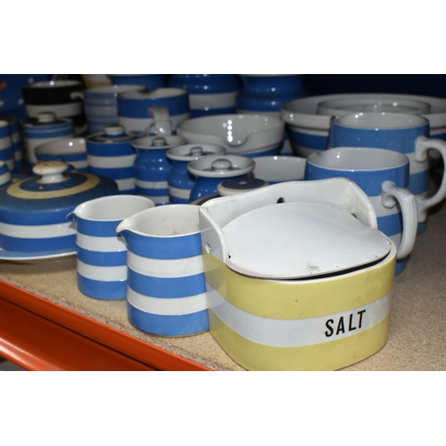 408 - A COLLECTION OF T G GREEN CORNISH WARE, over thirty mostly blue banded pieces, to include a yellow b... 