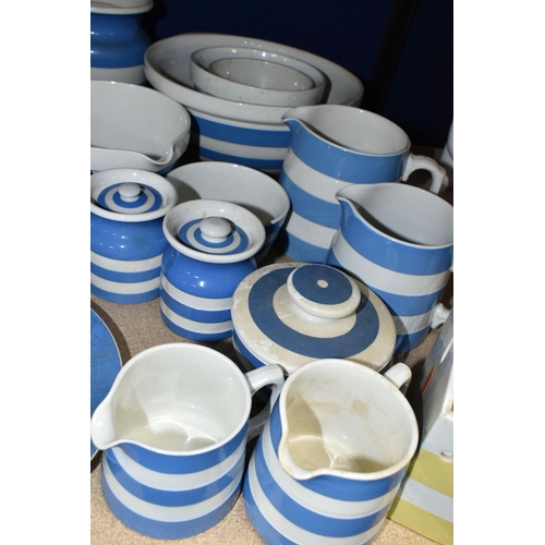 408 - A COLLECTION OF T G GREEN CORNISH WARE, over thirty mostly blue banded pieces, to include a yellow b... 