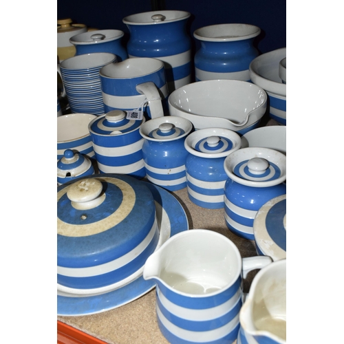 408 - A COLLECTION OF T G GREEN CORNISH WARE, over thirty mostly blue banded pieces, to include a yellow b... 