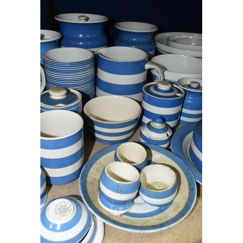 408 - A COLLECTION OF T G GREEN CORNISH WARE, over thirty mostly blue banded pieces, to include a yellow b... 