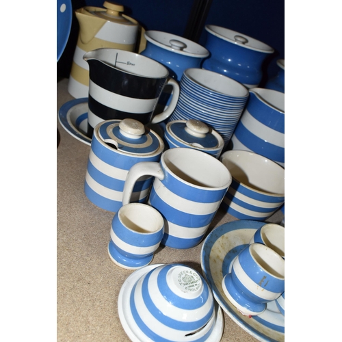 408 - A COLLECTION OF T G GREEN CORNISH WARE, over thirty mostly blue banded pieces, to include a yellow b... 