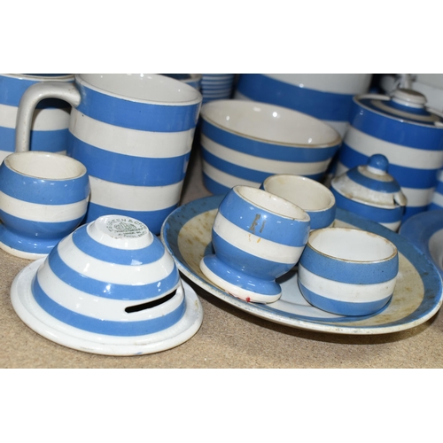 408 - A COLLECTION OF T G GREEN CORNISH WARE, over thirty mostly blue banded pieces, to include a yellow b... 