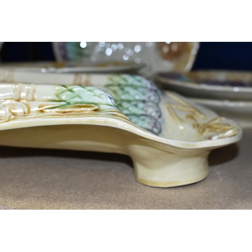 410 - A SET OF FRENCH ASPARAGUS DISHES, comprising a serving dish, length 37cm x width 21.5cm, and six ind... 