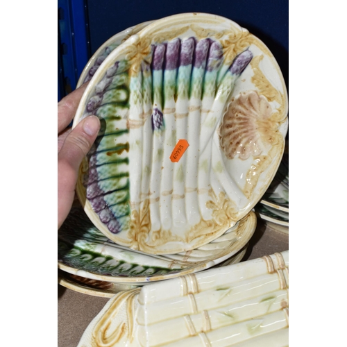 410 - A SET OF FRENCH ASPARAGUS DISHES, comprising a serving dish, length 37cm x width 21.5cm, and six ind... 