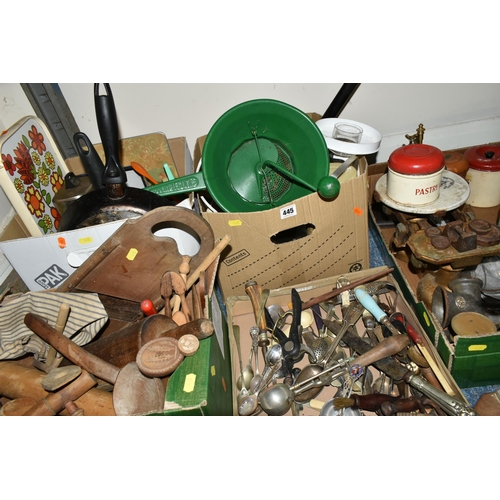 445 - FIVE BOXES OF EARLY TO MID TWENTIETH CENTURY KITCHENALIA, to include a quantity of wooden rolling pi... 