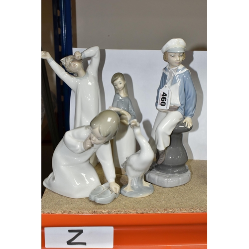 460 - FIVE LLADRO FIGURES, comprising Boy with Yacht model no 4810, sculptor Salvador Furio, issued 1972-1... 