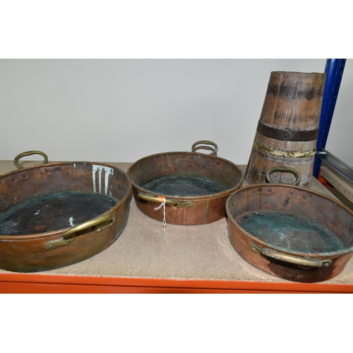 463 - THREE COPPER PANS AND A WOODEN BARREL, comprising three shallow twin handled copper pans, diameters ... 