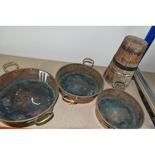 463 - THREE COPPER PANS AND A WOODEN BARREL, comprising three shallow twin handled copper pans, diameters ... 