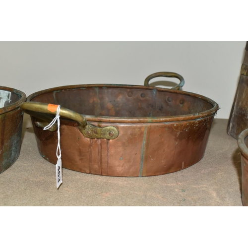 463 - THREE COPPER PANS AND A WOODEN BARREL, comprising three shallow twin handled copper pans, diameters ... 