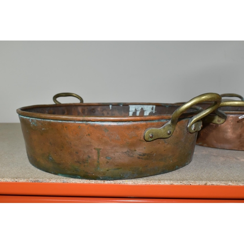 463 - THREE COPPER PANS AND A WOODEN BARREL, comprising three shallow twin handled copper pans, diameters ... 