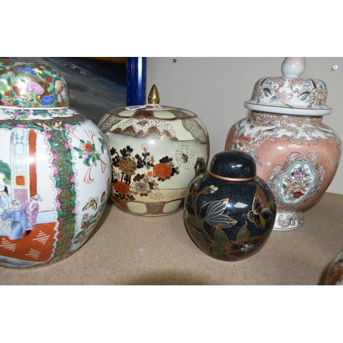 467 - EIGHT ORIENTAL GINGER JARS AND COVERED VASES, to include a famille rose ginger jar, two Satsuma jars... 