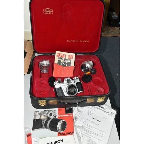 479 - A ZEISS IKON CONTAREX VINTAGE FILM SLR CAMERA fitted with a Carl Zeiss Jena Plannar 50mm f2 lens, So... 