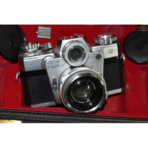 479 - A ZEISS IKON CONTAREX VINTAGE FILM SLR CAMERA fitted with a Carl Zeiss Jena Plannar 50mm f2 lens, So... 