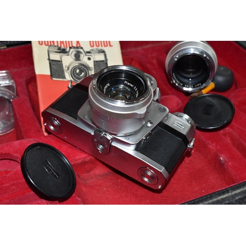 479 - A ZEISS IKON CONTAREX VINTAGE FILM SLR CAMERA fitted with a Carl Zeiss Jena Plannar 50mm f2 lens, So... 