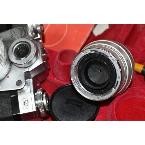 479 - A ZEISS IKON CONTAREX VINTAGE FILM SLR CAMERA fitted with a Carl Zeiss Jena Plannar 50mm f2 lens, So... 