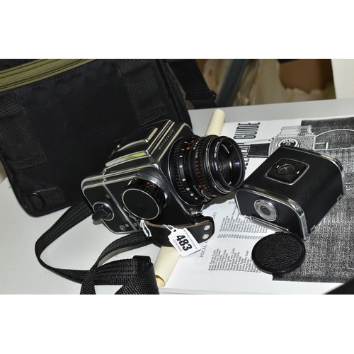 483 - A HASSELBLAD 500C/M MEDIUM FORMAT FILM CAMERA fitted with a Carl Zeiss Planar 80mm f2.8 lens, two fi... 