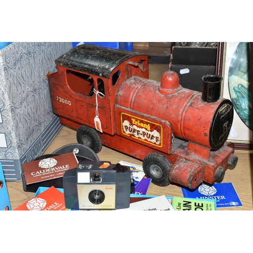 428 - TWO BOXES AND LOOSE TOY TRAIN, RAILWAY TIMETABLES AND A CAMERA, to include a Triang Puff-Puff train,... 