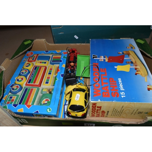 512 - THREE BOXES OF TOYS AND GAMES ETC, to include a Steiff Okapi, a wooden battleship, boxed magnetic bl... 