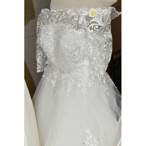 534 - NINE WEDDING DRESSES, all end of season stock clearance, assorted styles and sleeves, Ivory and whit... 