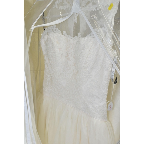 534 - NINE WEDDING DRESSES, all end of season stock clearance, assorted styles and sleeves, Ivory and whit... 