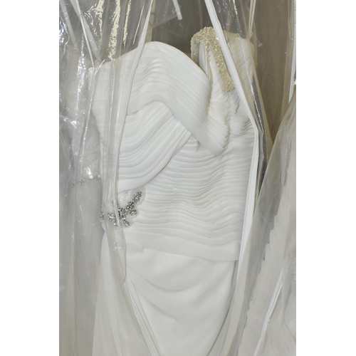 534 - NINE WEDDING DRESSES, all end of season stock clearance, assorted styles and sleeves, Ivory and whit... 