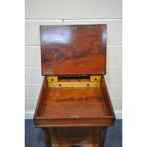 1191 - A REGENCY MAHOGANY DAVENPORT, the sloped top with a leather writing surface, enclosing a fitted inte... 