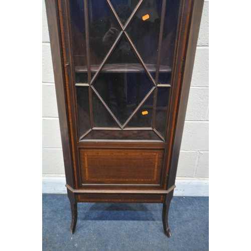 1196 - AN EDWARDIAN MAHOGANY AND MARQUETRY INLAID ASTRAGAL GLAZED SINGLE DOOR CORNER CUPBOARD, enclosing th... 