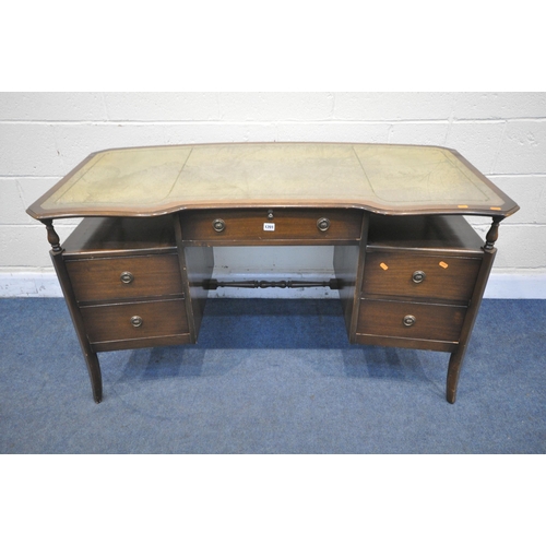 1201 - A MODERN REPRODUCTION KNEE HOLE DESK, with a green leather writing surface and five drawers, width 1... 