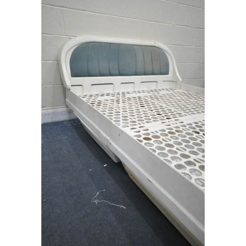 1202 - JAMES SECCOMBE, A WHITE PLASTIC FRAMED 4FT6 BEDSTEAD, complete with an integrated headboard, and fou... 