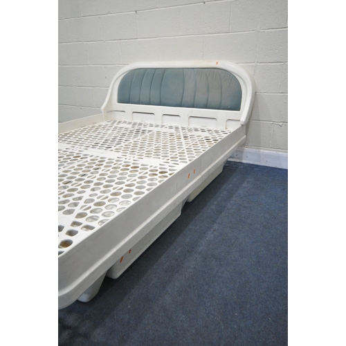 1202 - JAMES SECCOMBE, A WHITE PLASTIC FRAMED 4FT6 BEDSTEAD, complete with an integrated headboard, and fou... 