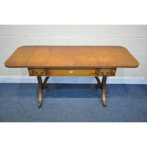 1206 - A BEVAN FUNNEL REPRODUX MAHOGANY DROP LEAF GAMES SOFA TABLE, with reversible slide top enclosing bac... 