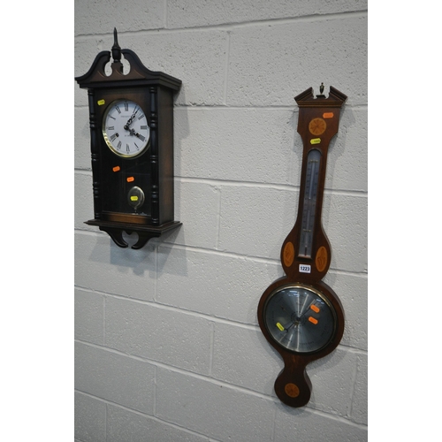 1223 - A EDWARDIAN STYLE COMITTI MAHOGANY BAROMETER, height 94cm, along with a modern president wall clock ... 