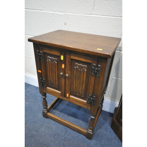 1225 - AN OLD CHARM OAK CANTED SINGLE DOOR CABINET, with a single draw, width 77cm x depth 34cm x height 82... 