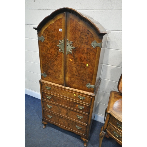 1228 - A 20TH CENTURY BURR WALNUT AND CROSS BANDED QUEEN ANNE STYLE BEDROOM SUITE, comprising a two door li... 