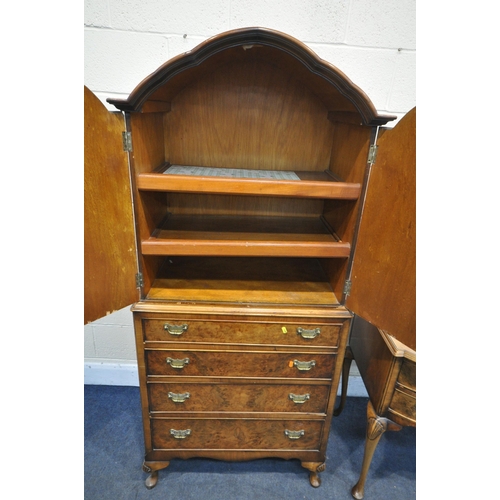 1228 - A 20TH CENTURY BURR WALNUT AND CROSS BANDED QUEEN ANNE STYLE BEDROOM SUITE, comprising a two door li... 