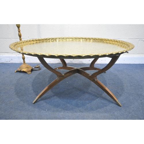 1233 - A LARGE ANGLO INDIAN BRASS TOP COFFEE TABLE, decorated with foliate detail surrounded  by moulded ed... 