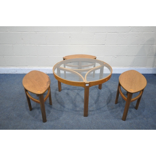 1234 - A MID CENTURY NATHAN TRINITY TEAK CIRCULAR COFFEE TABLE with a glass insert, with a matching set of ... 