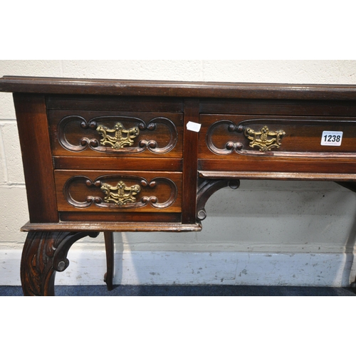 1238 - A LATE VICTORIAN MAHOGANY LADIES DESK, with a green leather writing surface and five draws on cabrio... 