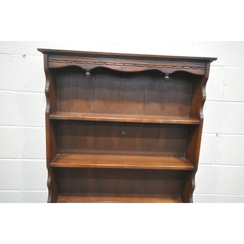 1239 - AN OLD CHARM OAK DRESSER, with two drawers and linenfold double doors, width 93cm x depth 43cm x hei... 