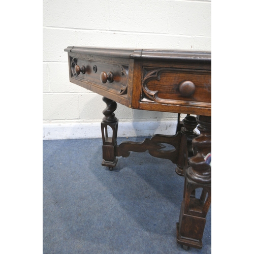 1242 - A 19TH CENTURY OAK GOTHIC REVIVAL OCTAGONAL CENTRE LIBRARY TABLE, with a green leather writing surfa... 