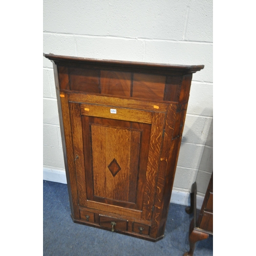 1257 - A GEORGIAN MAHOGANY AND OAK HANGING CORNER CUPBOARD, width 80cm x depth 41cm x height 125cm (one key... 