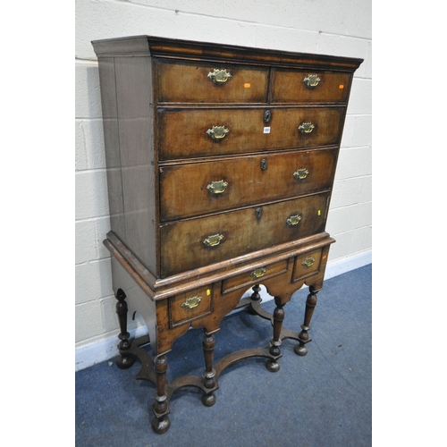 1267 - A PART QUEEN ANNE WALNUT CHEST ON STAND, the top section with two short over three long drawers, wit... 