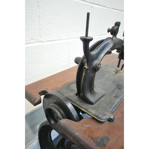 1269 - A LATE 19TH/EARLY 20TH CENTURY HURTU FRENCH CAST IRON TREADLE SEWING MACHINE, width 69cm x depth 44c... 