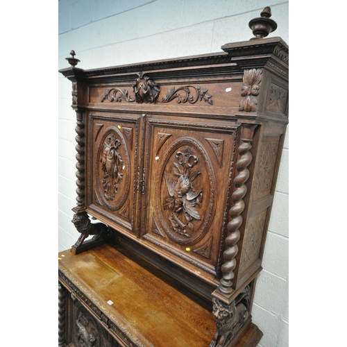 1271 - AN EARLY 20TH CENTURY FRENCH CARVED OAK BUFFET CABINET, each panel depicting either pheasants, fish,... 