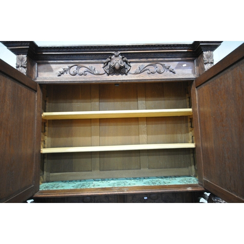 1271 - AN EARLY 20TH CENTURY FRENCH CARVED OAK BUFFET CABINET, each panel depicting either pheasants, fish,... 