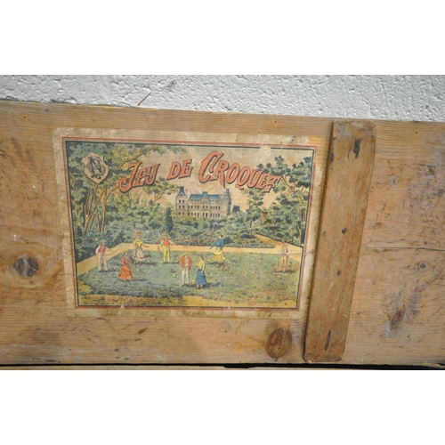 1272 - A VINTAGE FRENCH CROQUET SET, in a pine case, the inner lid reading 'Jeu De Croquet' (condition:- in... 